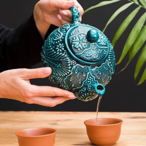 Alternative view of Ấm chén khắc nổi